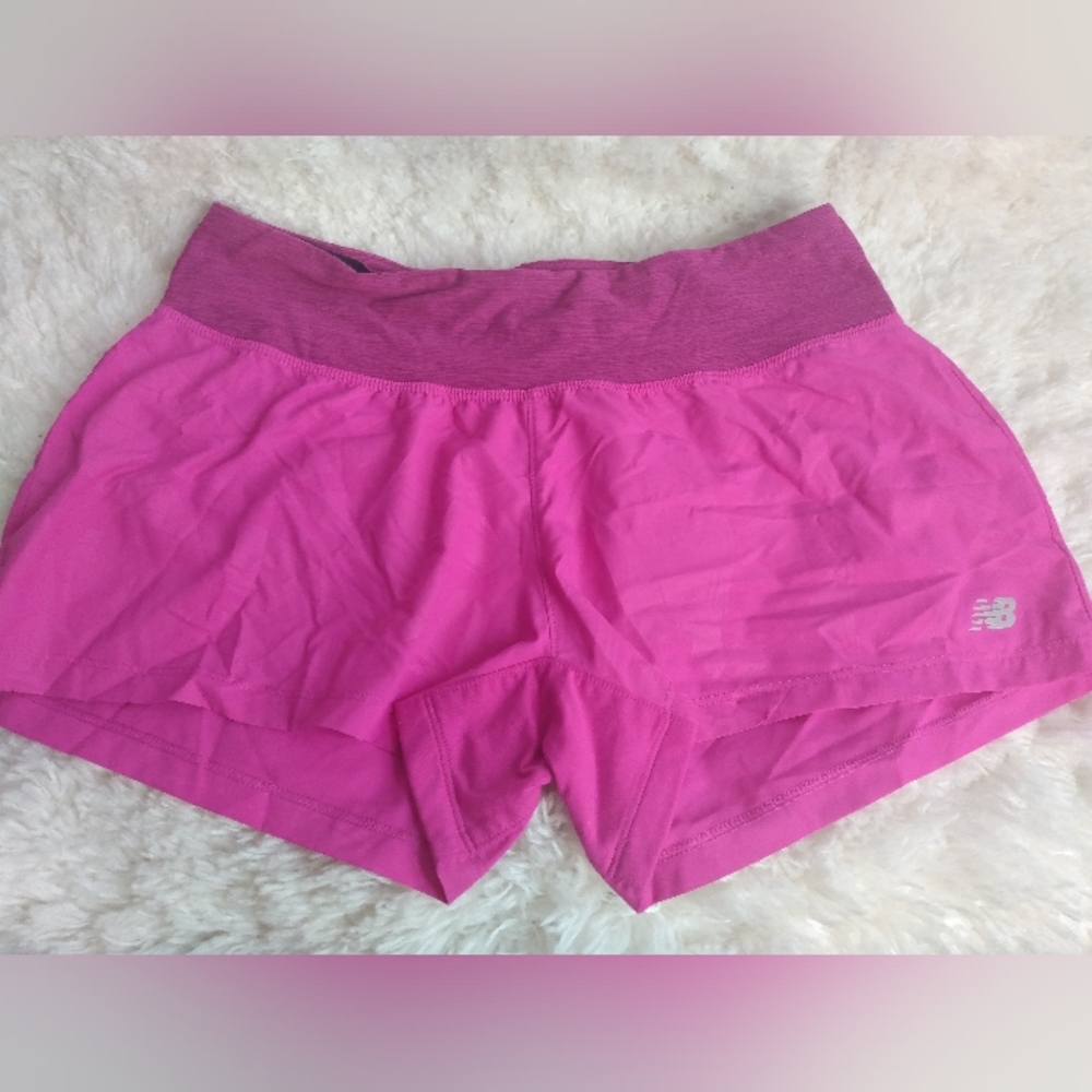 NWOT New Balance woman's size medium magenta athletic shorts